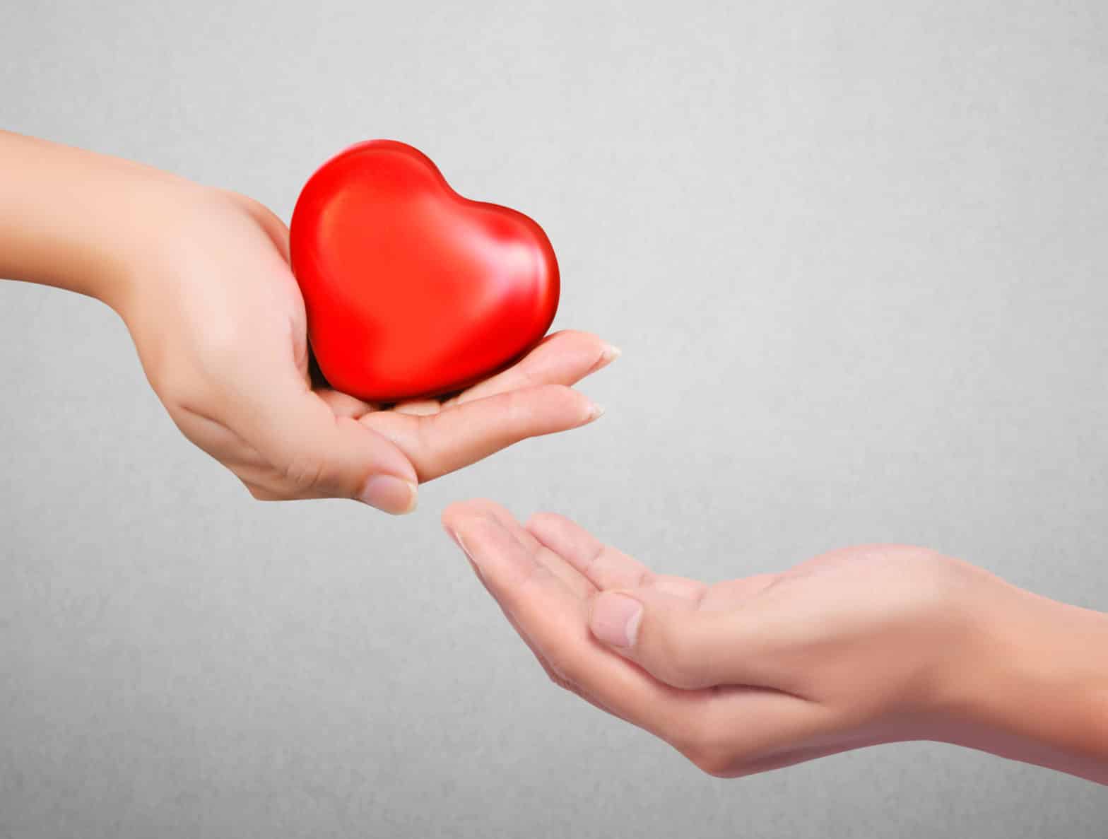 (Image: a hand holding a heart, giving it as a gift) 10 Tips Relationship advice for Couples & the Lonely Hearts, Joanne Tan, 10PlusBrand.com