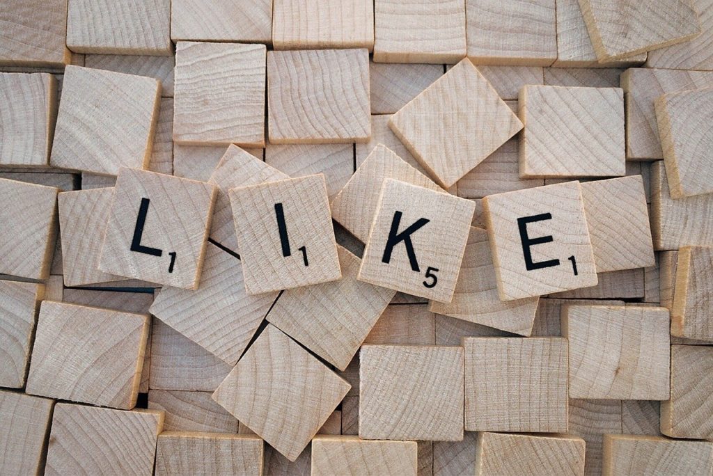 Do content value, popularity, social media engagements raise Linkedin ranking? Blog by Joanne Tan, branding expert, 10 Plus Brand, Inc. (Photo of wooden blocks)