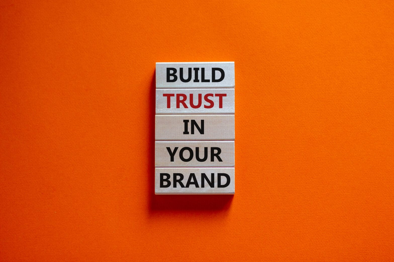 Brand trust in AI transformation depends on robust data privacy, human-to-human customer experience, & brand authenticity in place of AI slop, per Joanne Z. Tan