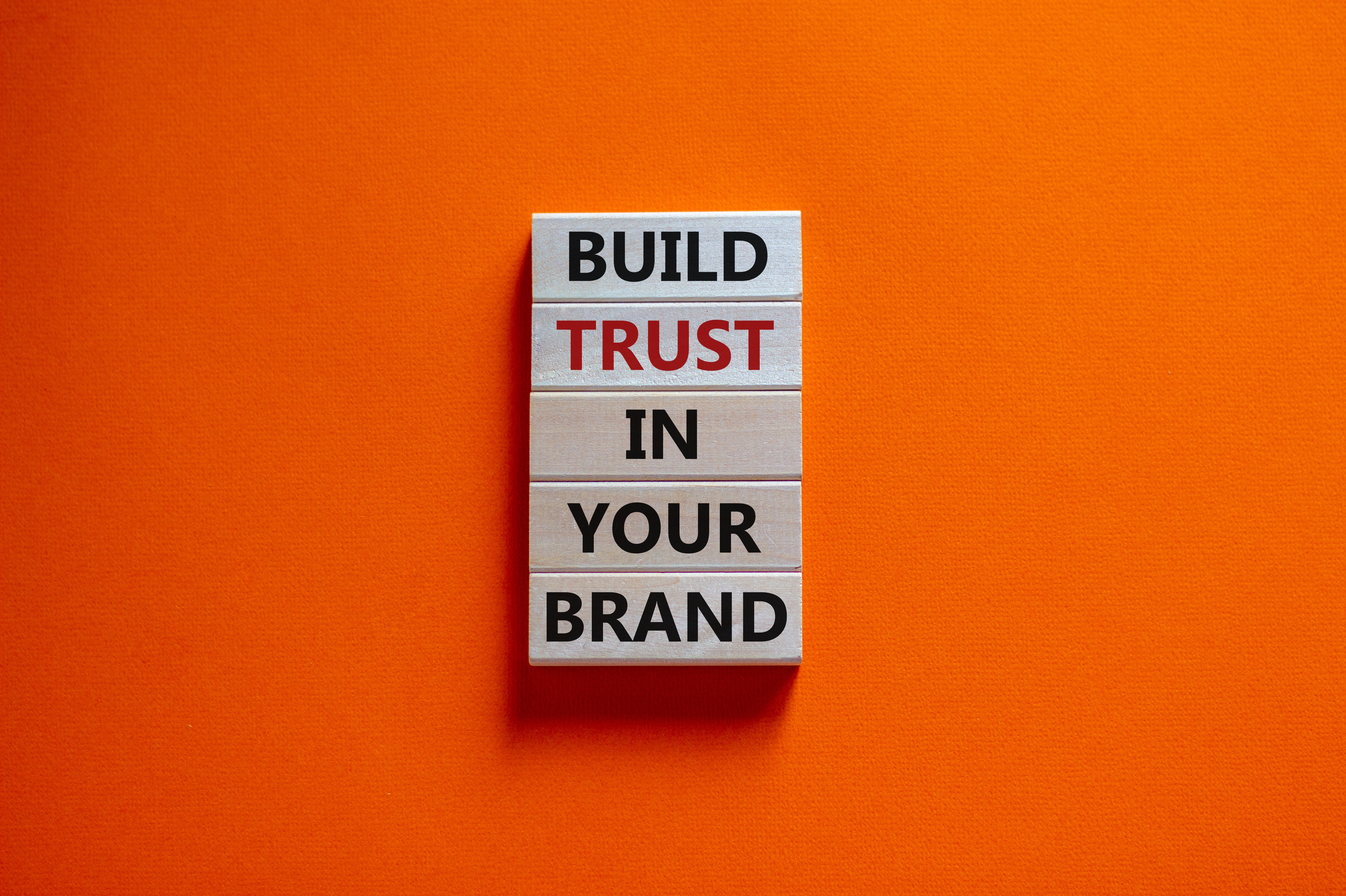 Brand trust in AI transformation depends on robust data privacy, human-to-human customer experience, & brand authenticity in place of AI slop, per Joanne Z. Tan
